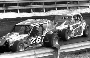 Future NASCAR Modified and Grand National standout Mike McLaughlin (CraZ8), in his regular dirt Modified ride battles Kenny Brightbill. Rick Sweeten photo.