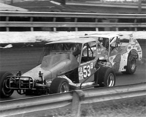 The conventional Modified of Win Slavin (53) and Frank Cozze's (44) remodeled dirt Modified during the 1980 Schaefer 200. Rick Sweeten photo.